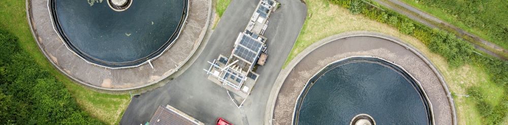 Aerial view of a small sewage treatment plant.